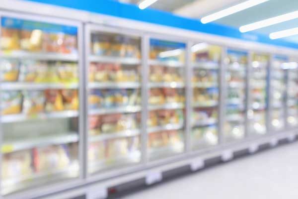 supermarket-commercial-refrigerators-freezer-showing-frozen-foods-abstract-blur-background
